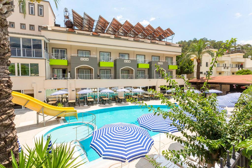 The swimming pool at or close to Rich Melissa Hotel