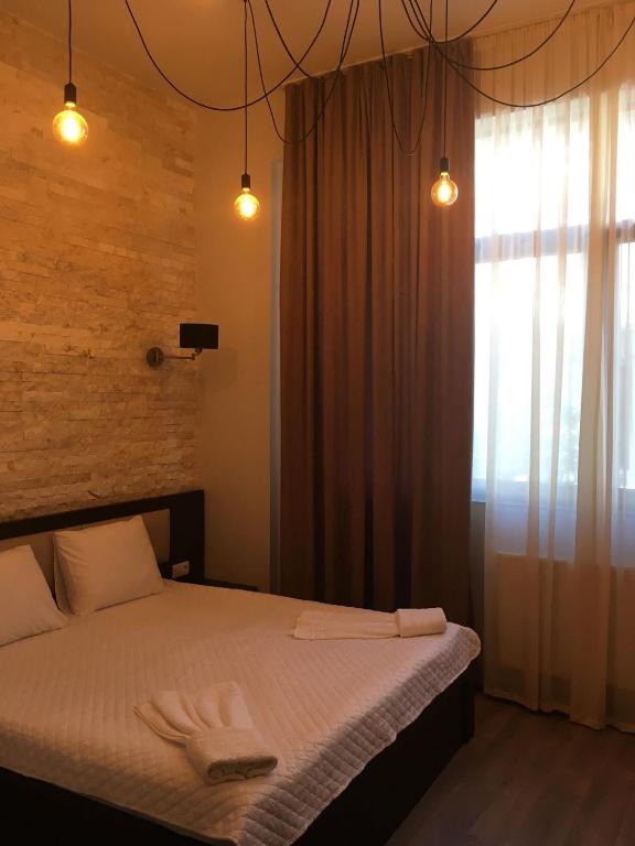 Postel nebo postele na pokoji v ubytování Iveria
