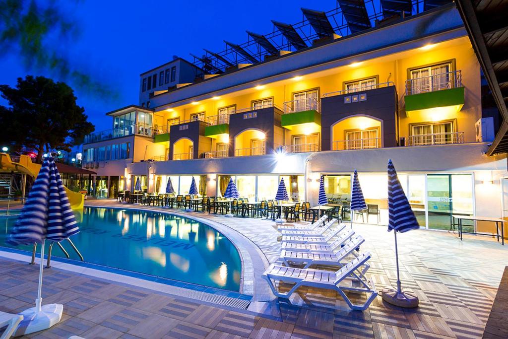 The swimming pool at or close to Rich Melissa Hotel