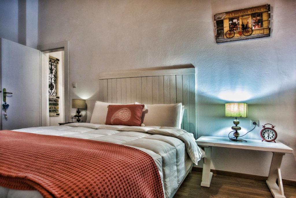 Posteľ alebo postele v izbe v ubytovaní Maya's Boutique Residence