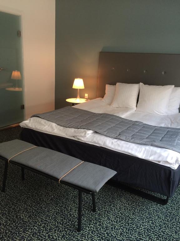 Postel nebo postele na pokoji v ubytování Glostrup Park Hotel