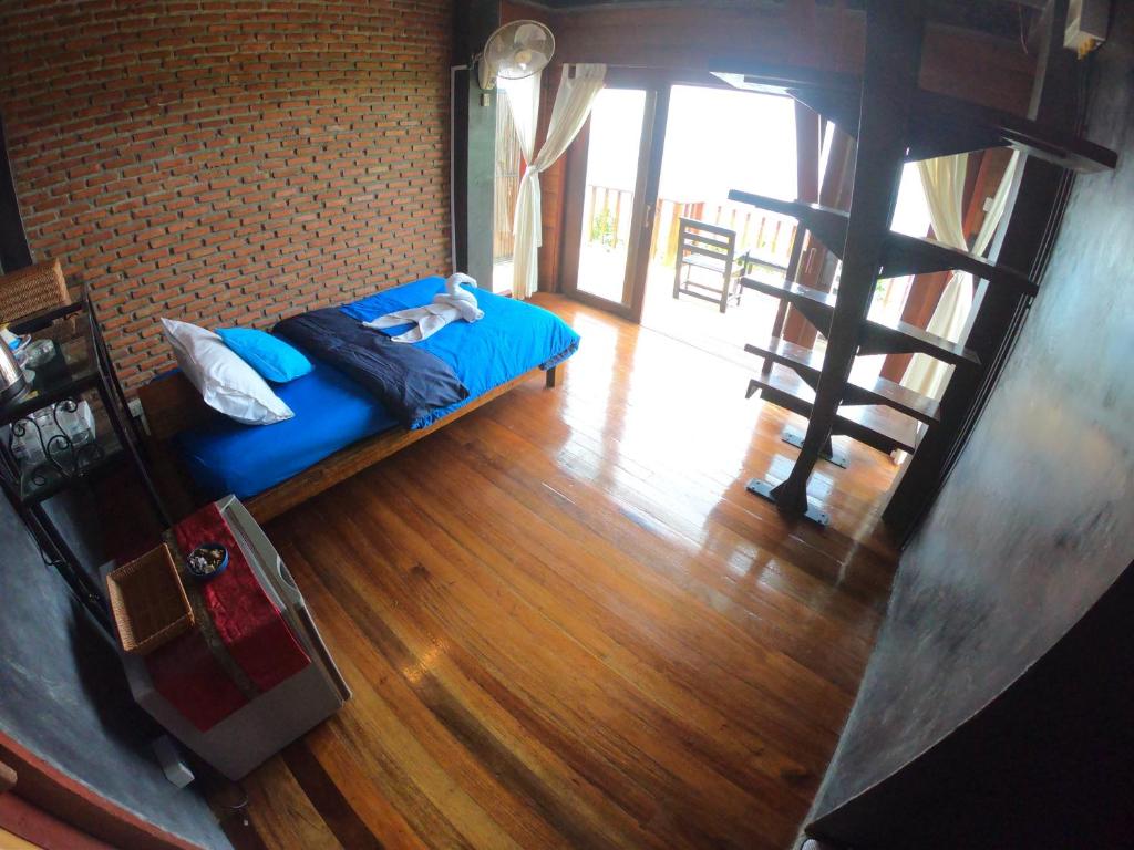 Postel nebo postele na pokoji v ubytování Blue Heaven Resort Koh Tao
