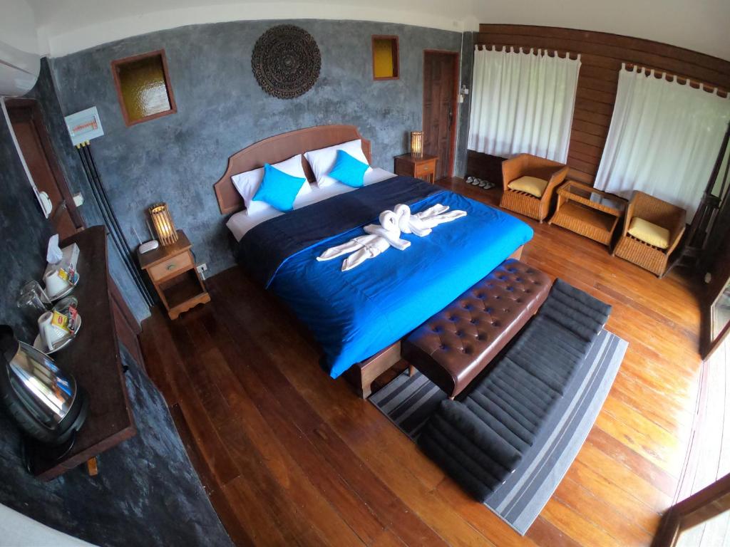 Postel nebo postele na pokoji v ubytování Blue Heaven Resort Koh Tao