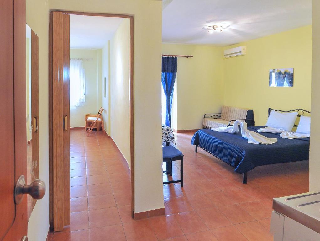 Postel nebo postele na pokoji v ubytování Panagiotis Hotel
