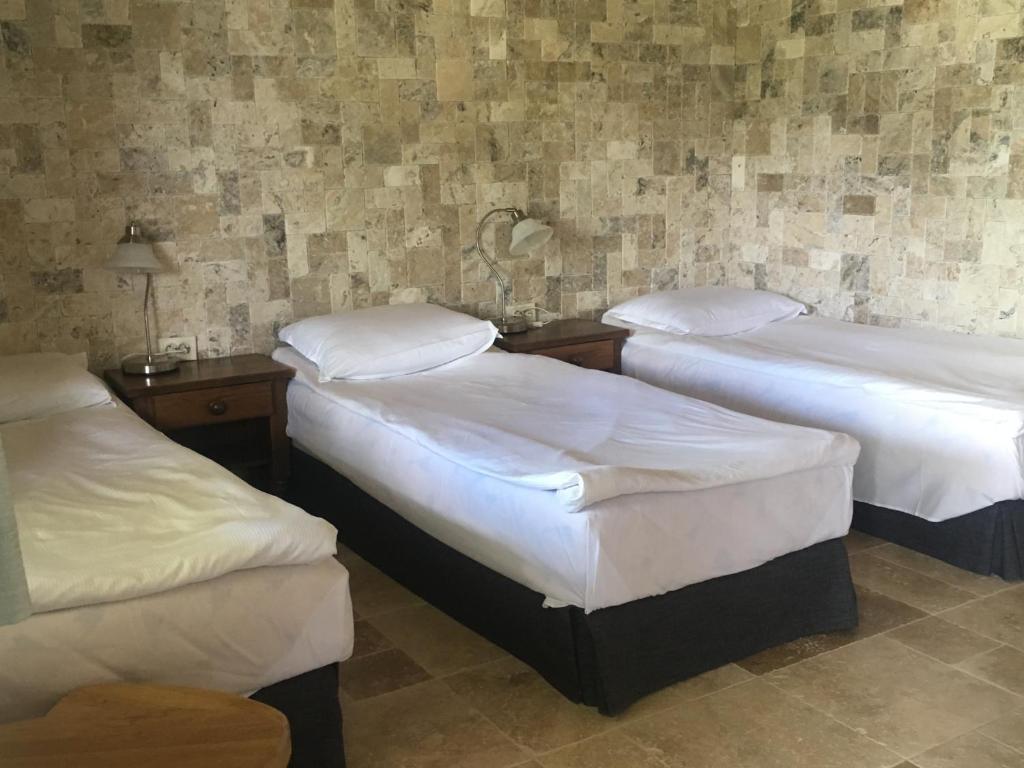 Postel nebo postele na pokoji v ubytování Hotel Anchor
