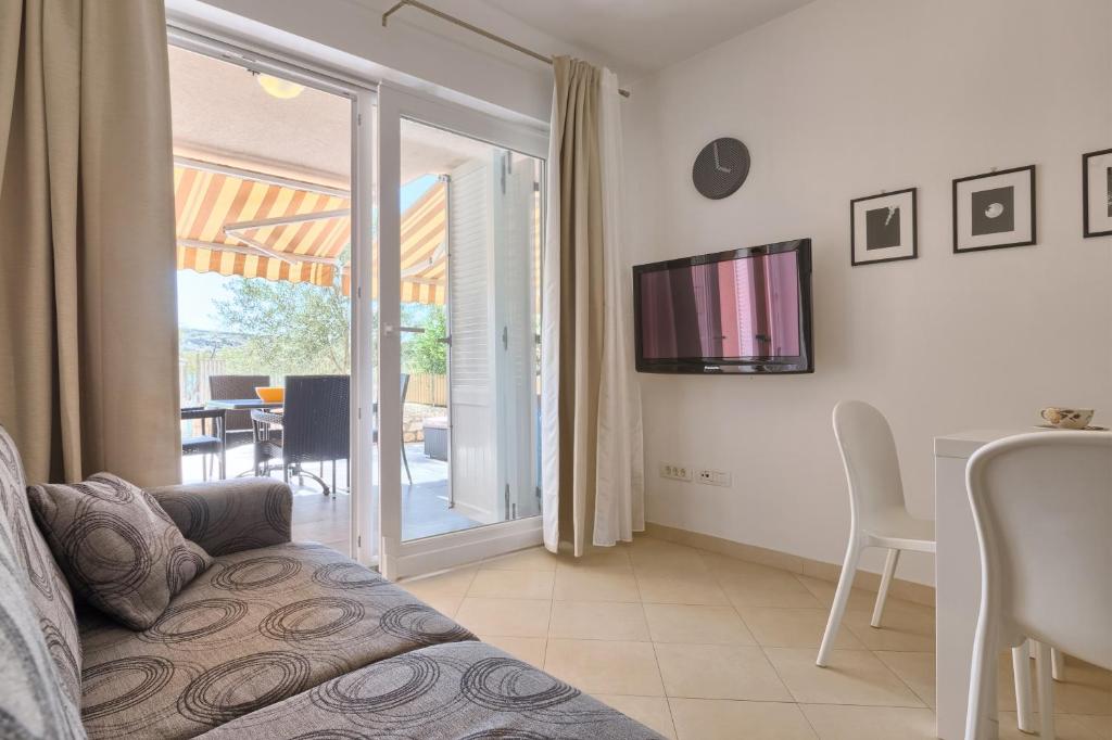 Telewizja i/lub zestaw kina domowego w obiekcie Apartment Robert