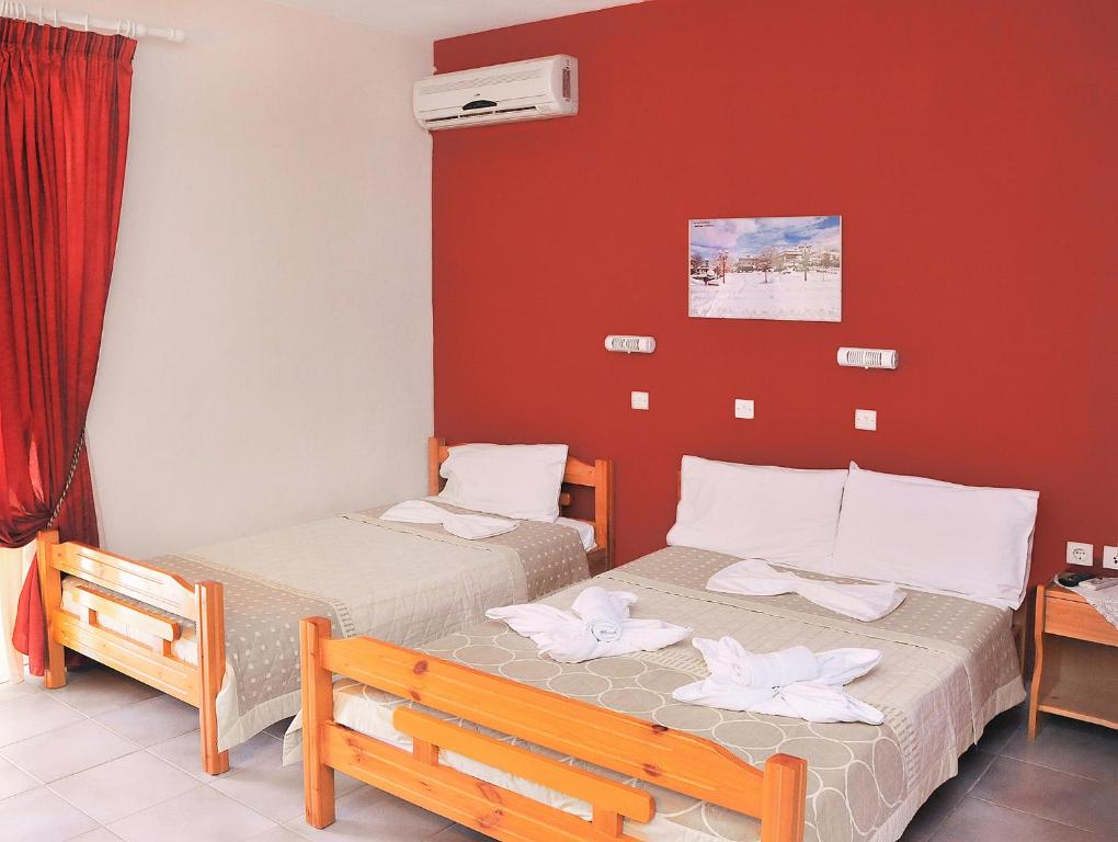Postel nebo postele na pokoji v ubytování Panagiotis Hotel