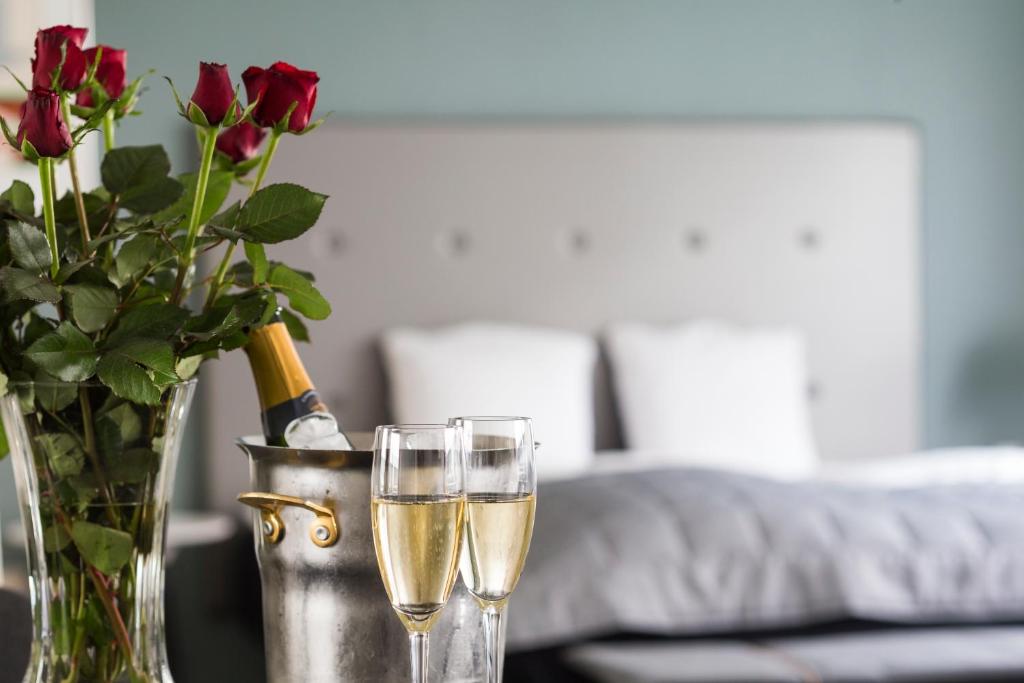 Postel nebo postele na pokoji v ubytování Glostrup Park Hotel