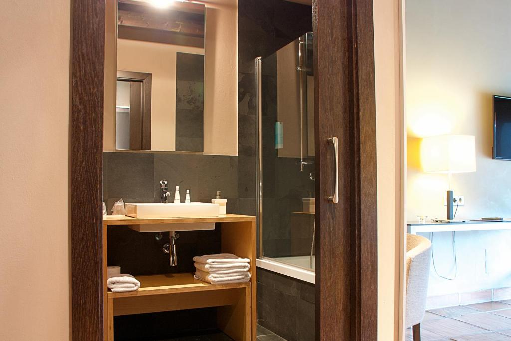 Koupelna v ubytování Hotel Rural-Spa Resguard Dels Vents