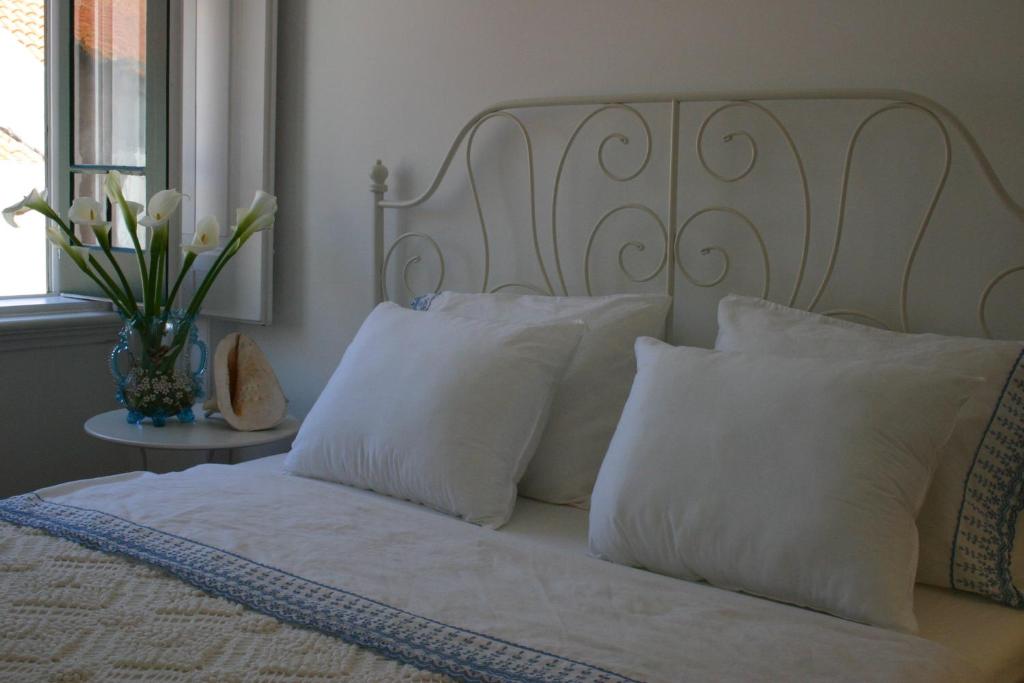 Ліжко або ліжка в номері Casa Sesimbra
