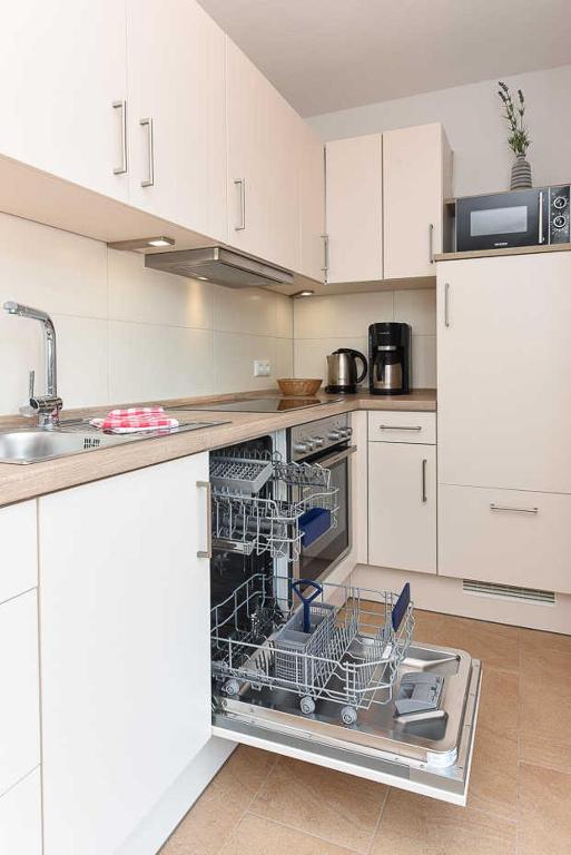 Kuchyň nebo kuchyňský kout v ubytování Ferienwohnung Seeperle