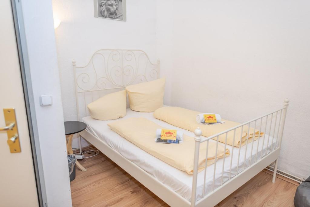 Postel nebo postele na pokoji v ubytování BackpackerBerlin