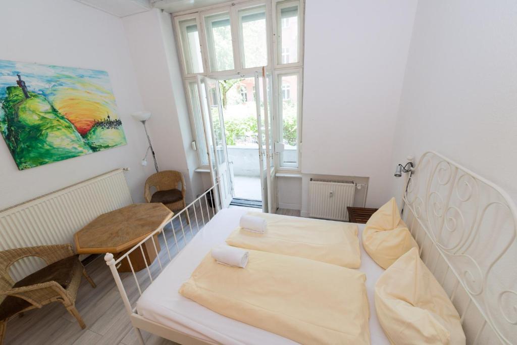 Postel nebo postele na pokoji v ubytování BackpackerBerlin