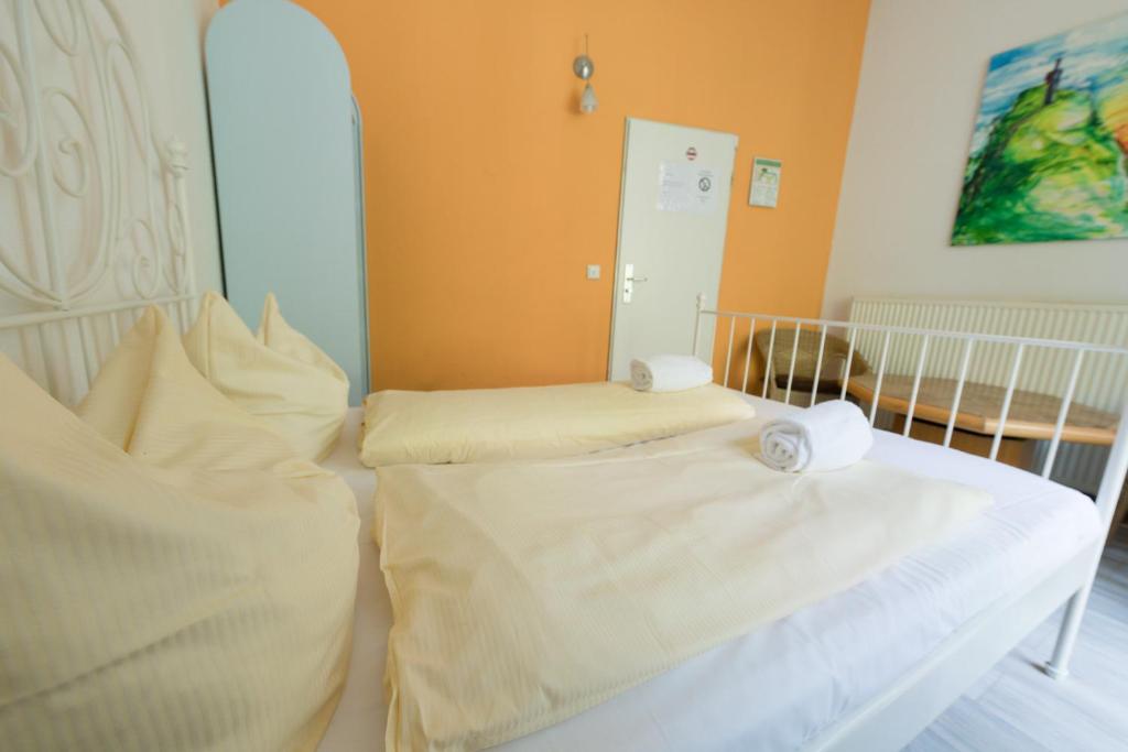 Postel nebo postele na pokoji v ubytování BackpackerBerlin