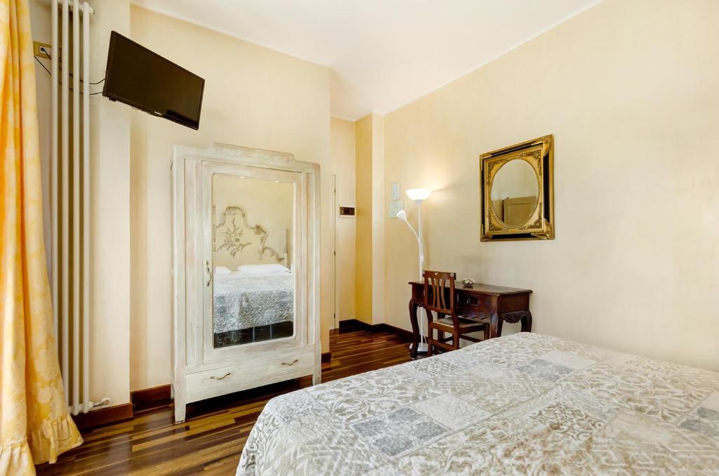 Posteľ alebo postele v izbe v ubytovaní Hotel Original