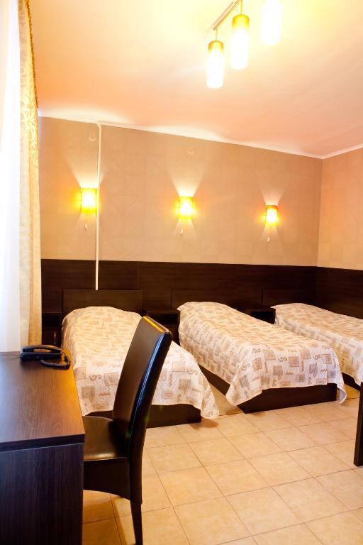 Postel nebo postele na pokoji v ubytování Hotel Complex Verhovina