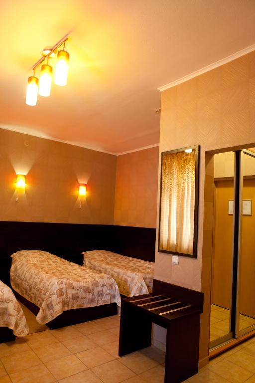 Postel nebo postele na pokoji v ubytování Hotel Complex Verhovina