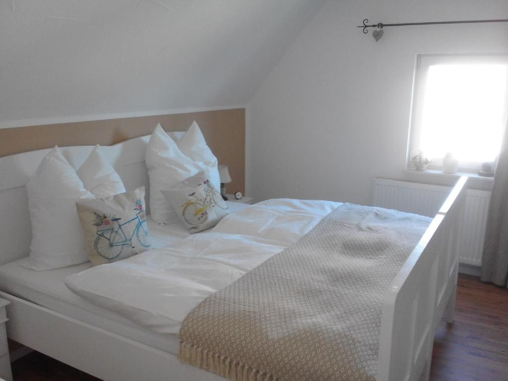 Postel nebo postele na pokoji v ubytování Guest House Dommitzsch