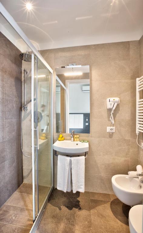 Koupelna v ubytování Hotel Clara