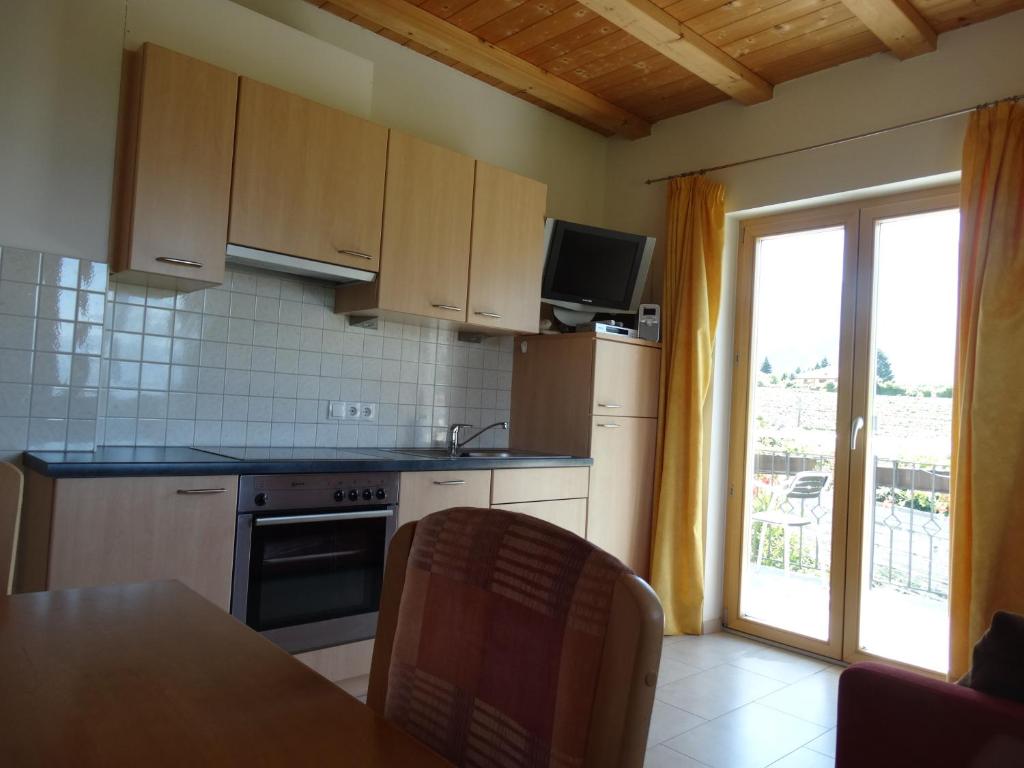 Kuchyň nebo kuchyňský kout v ubytování Fasslhof