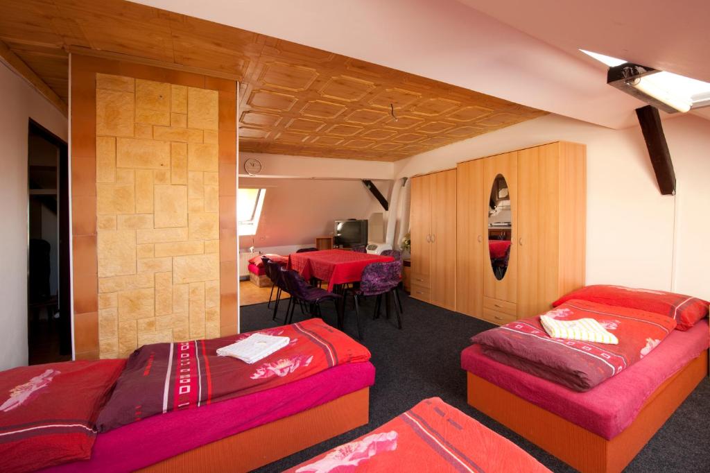 Postel nebo postele na pokoji v ubytování Hotel u Nádraží Lanžhot