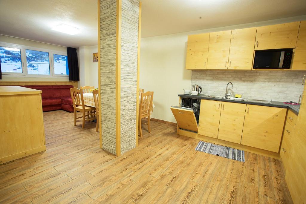 Kuchyň nebo kuchyňský kout v ubytování Steinbock B&B - Apartaments