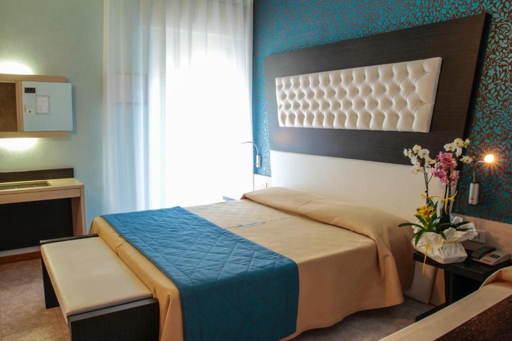 Postel nebo postele na pokoji v ubytování Hotel Hollywood***S