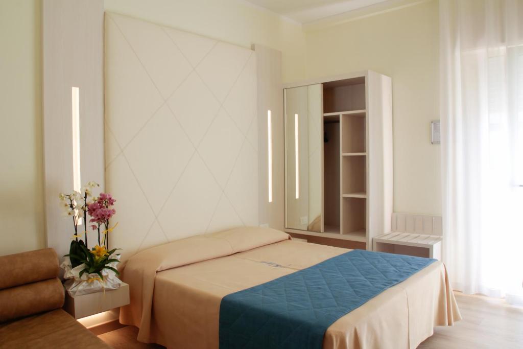Postel nebo postele na pokoji v ubytování Hotel Hollywood***S