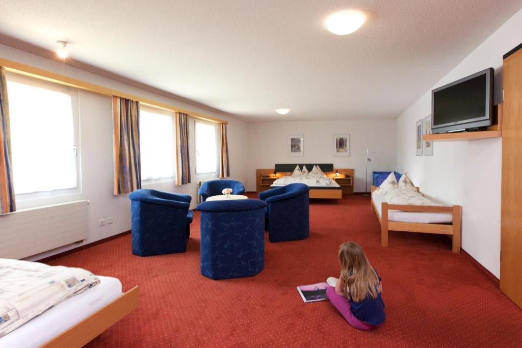 TV a/nebo společenská místnost v ubytování Hotel Arkanum