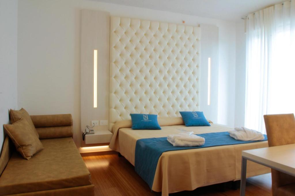 Postel nebo postele na pokoji v ubytování Hotel Hollywood***S
