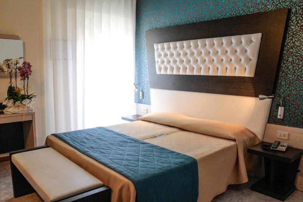 Postel nebo postele na pokoji v ubytování Hotel Hollywood***S