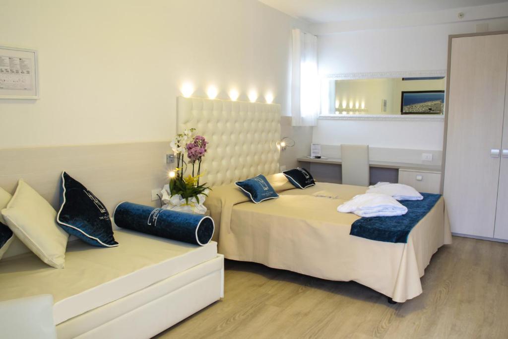 Postel nebo postele na pokoji v ubytování Hotel Hollywood***S