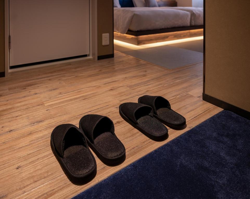 Postel nebo postele na pokoji v ubytování Hotel Resol Kyoto Kawaramachi Sanjo