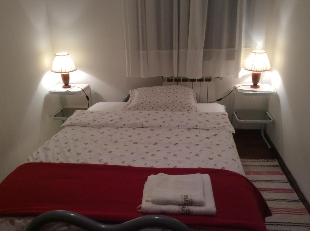 Postel nebo postele na pokoji v ubytování Casa Vacanze All'Orizzonte Duino