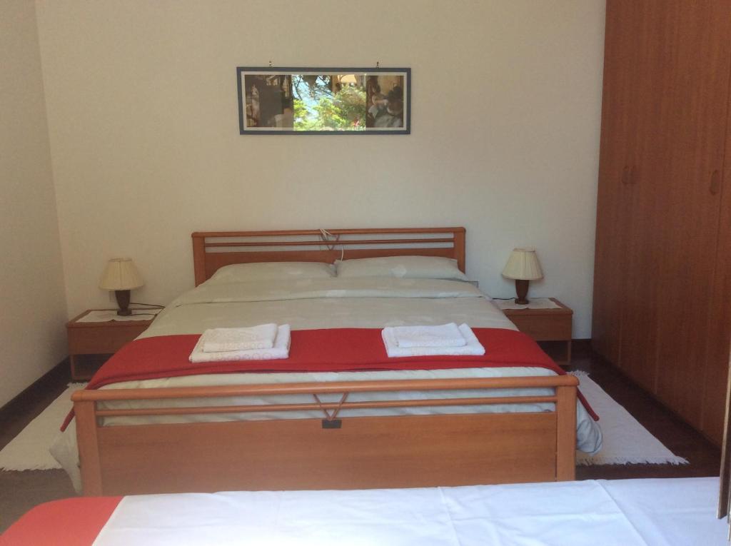 Postel nebo postele na pokoji v ubytování Casa Vacanze All'Orizzonte Duino