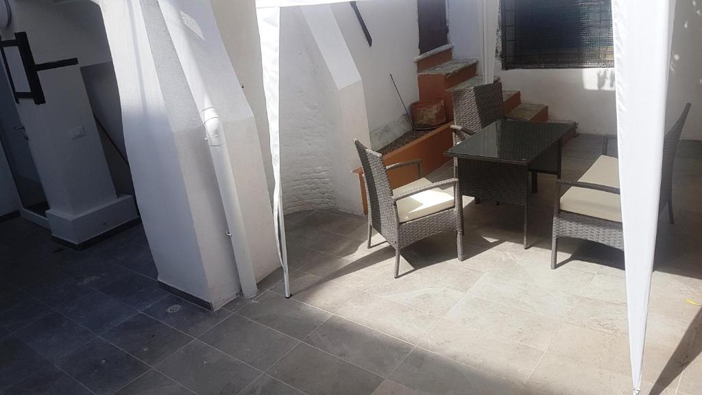 A seating area at CORTE SCONTA Mini-Loft