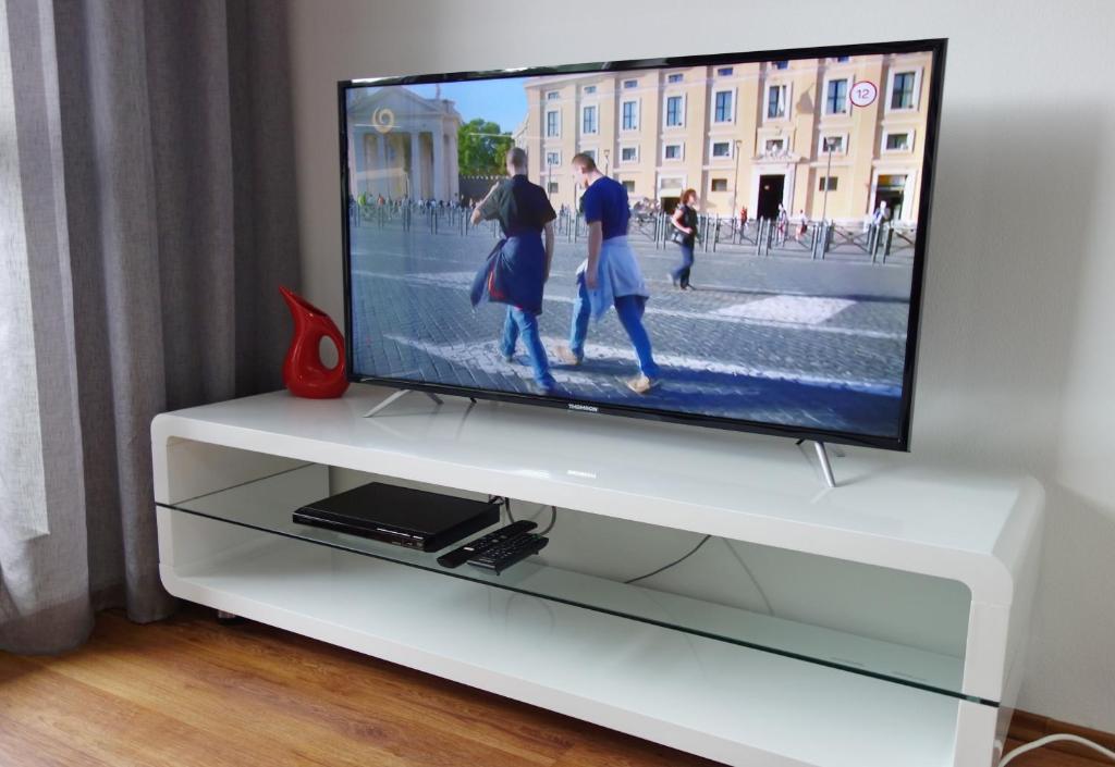 TV a/nebo společenská místnost v ubytování Apartmán s výhľadom na Tatry
