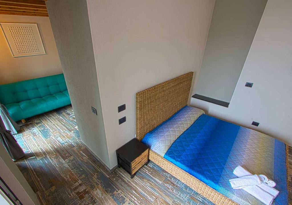 Postel nebo postele na pokoji v ubytování Oltremare Guest House