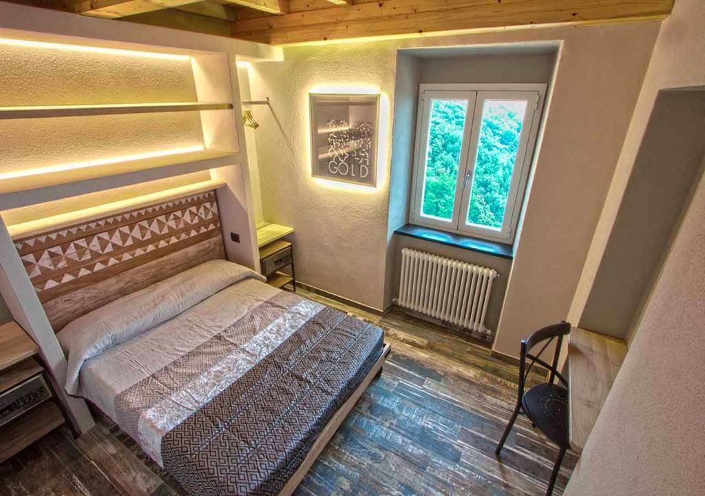 Postel nebo postele na pokoji v ubytování Oltremare Guest House