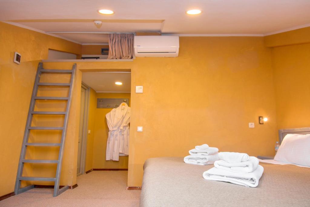 Postel nebo postele na pokoji v ubytování Kindli Boutique Hotel
