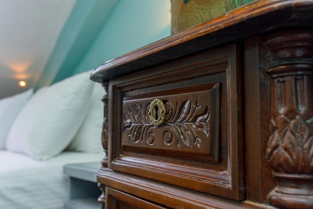 Postel nebo postele na pokoji v ubytování Kindli Boutique Hotel