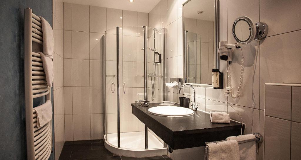 Koupelna v ubytování Hotel Gramaser