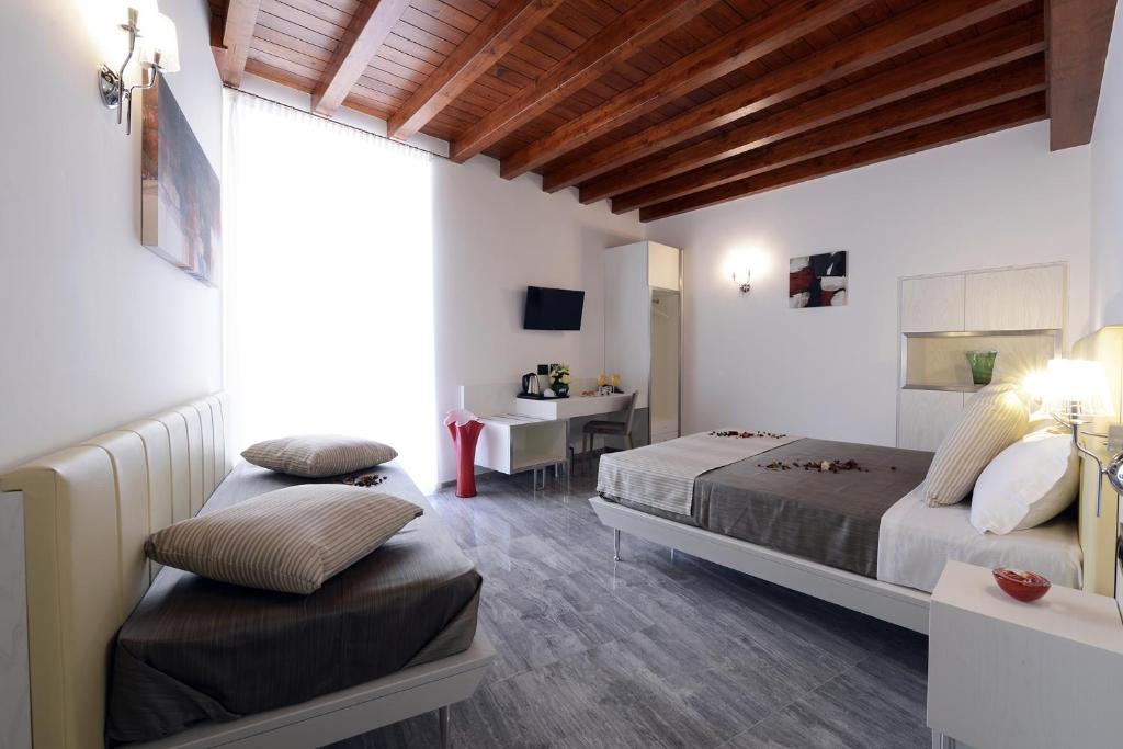 Posteľ alebo postele v izbe v ubytovaní Best Western Hotel Principe di Lampedusa