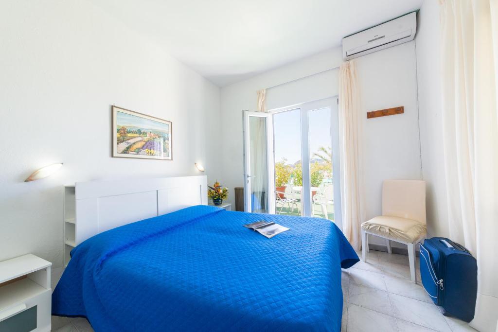 Postel nebo postele na pokoji v ubytování B&B Verde