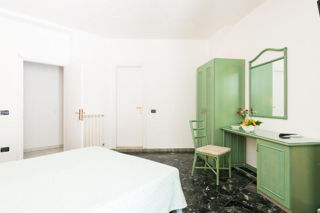 Postel nebo postele na pokoji v ubytování B&B Verde