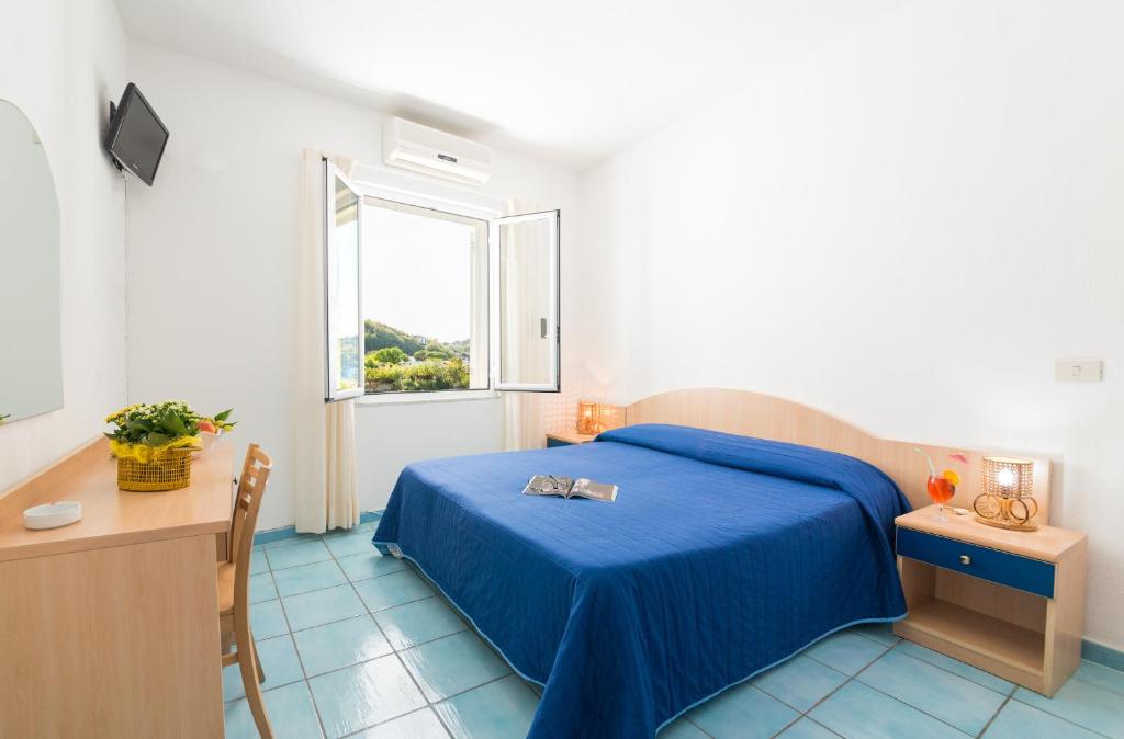 Postel nebo postele na pokoji v ubytování B&B Verde