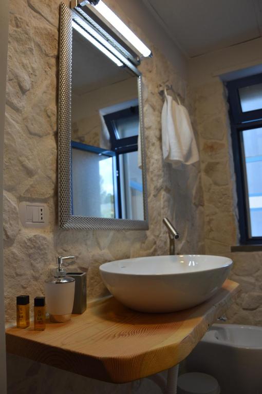 Koupelna v ubytování Hotel Residence La Corvetta