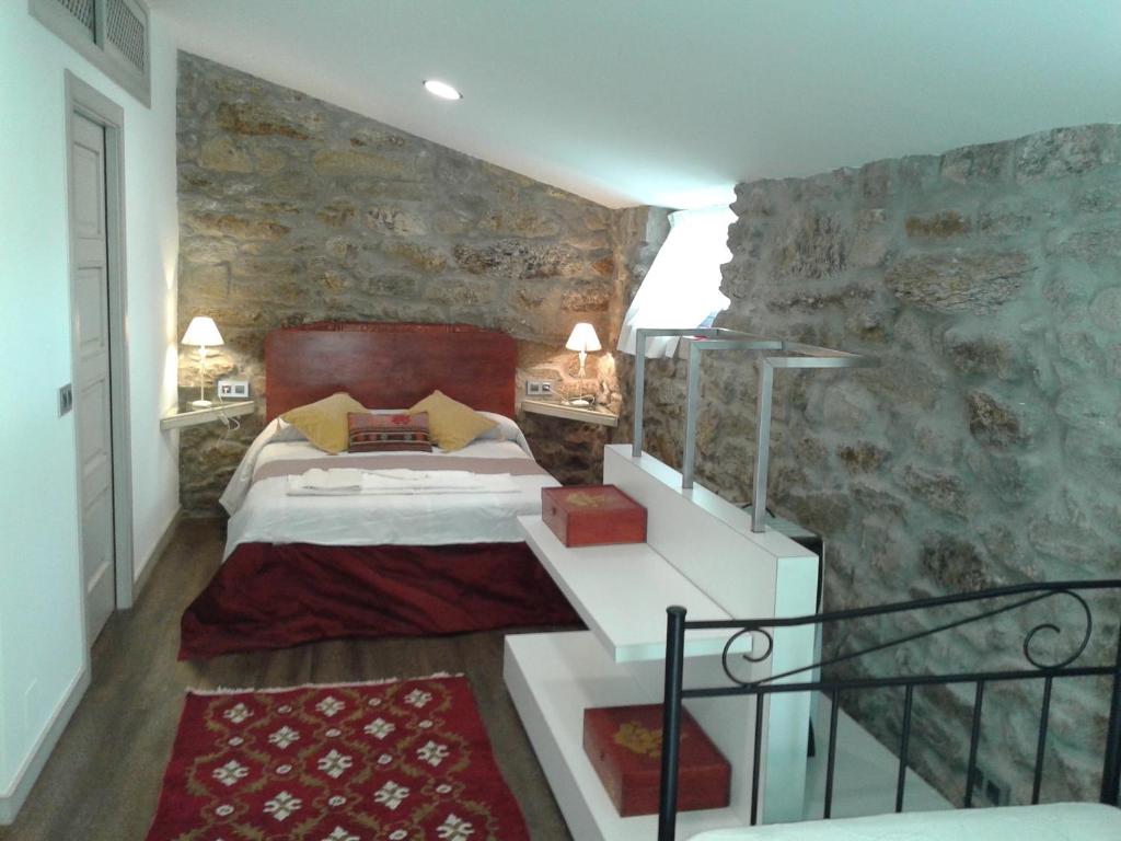 En eller flere senger på et rom på A casa de Mateu