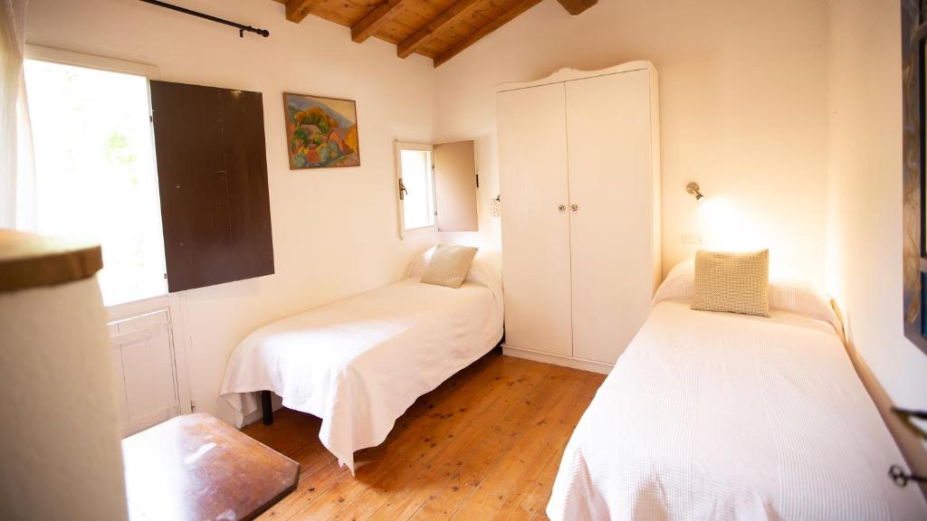 Postel nebo postele na pokoji v ubytování Casa Rosa