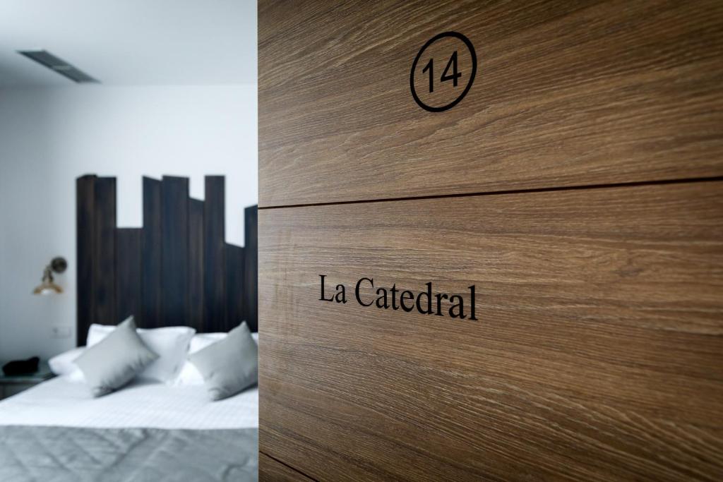 Rúm í herbergi á Suite Home Pinares